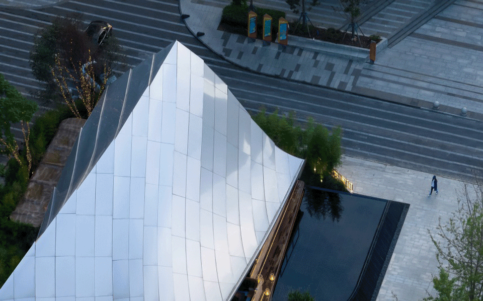 什么是雙曲鋁單板？備受設(shè)計師青睞的幕墻材料。